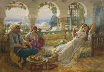 SUR LA TERRASSE Frederick Arthur Bridgman Arabe Peinture à l'huile
